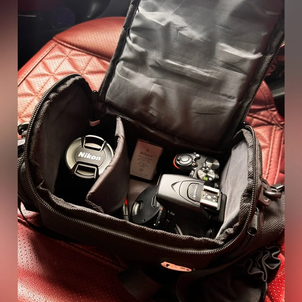 Brand New Nikon. Was used about 3 times. Bundle includes a carrying bag, 18-55mm